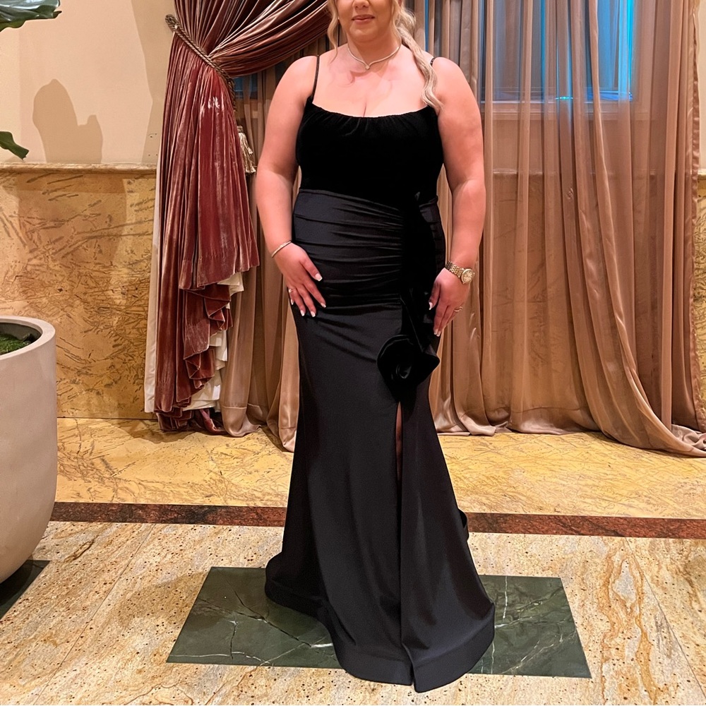 Black evening gown with small trail